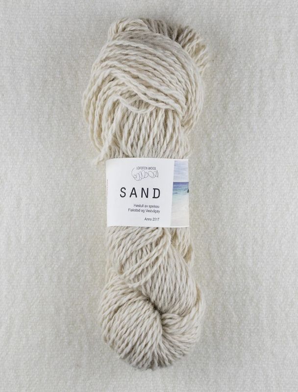 Sand dekkhårsgarn av spelsau